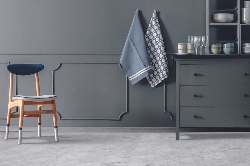 stone look luxury vinyl flooring in modern gray bathroom